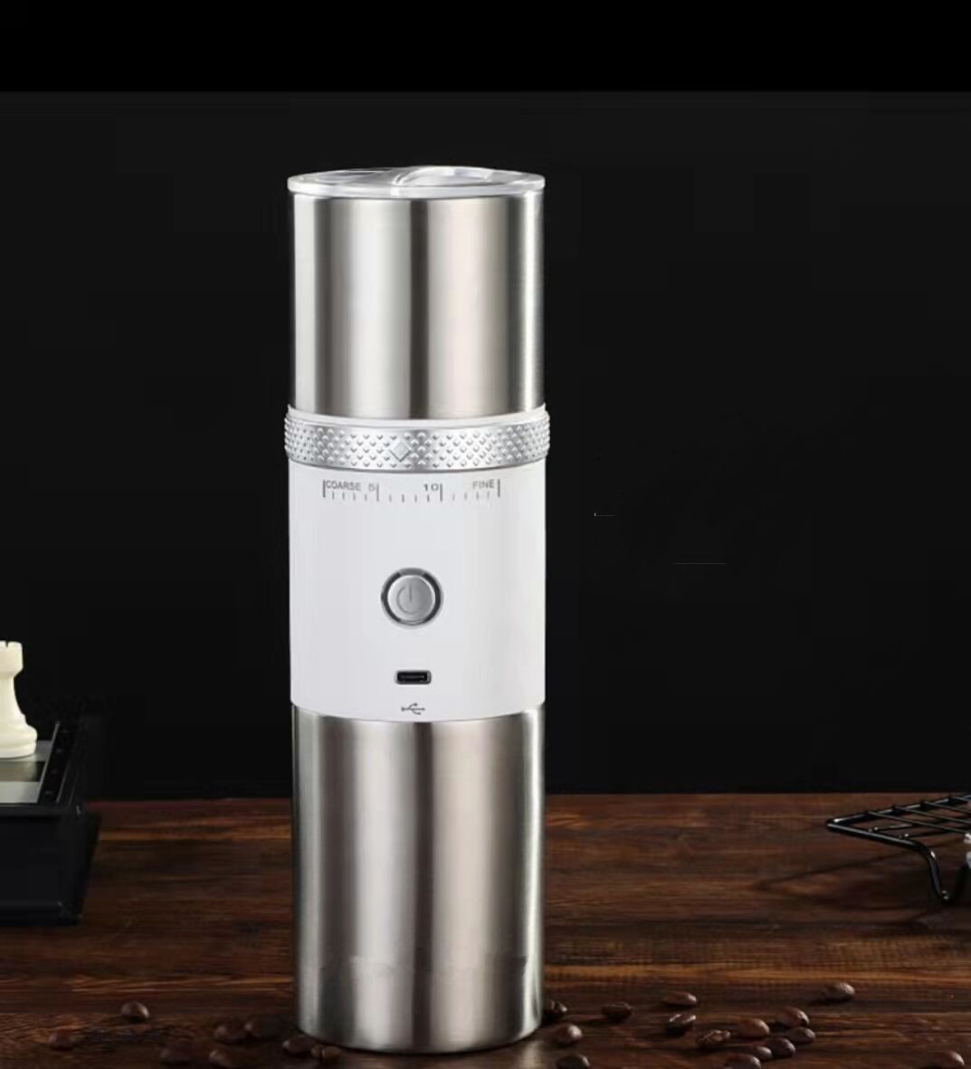 USB electric coffee cup portable office coffee maker with stainless steel body and one-button operation.